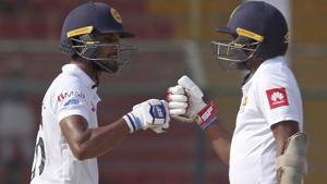 Sri Lankan batsman Dinesh Chandimal, left, celebrates his fifty.(AP) Sri Lankan batsman Dinesh Chandimal, left, celebrates his fifty.(AP)