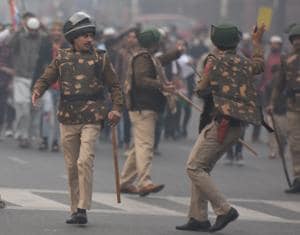 Police personnel seen during a protest against new citizenship law at Daryaganj in New Delhi on December 20, 2019. (Photo by Raj K Raj/ Hindustan Times)