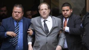 This Dec. 6, 2019 file photo shows Harvey Weinstein, center, leaving court following a bail hearing in New York.(AP) This Dec. 6, 2019 file photo shows Harvey Weinstein, center, leaving court following a bail hearing in New York.(AP)