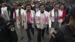 Assam state Chief Minister Sarbananda Sonowal, front second right, and Finance Minister Himanta Biswa Sarma, right, march in a procession organized by the ruling Bharatiya Janata Party urging for peace after violence broke out in several parts of the country during protests against the Citizenship Amendment Act, in Nalbari, India, Friday, Dec. 20, 2019.(AP photo) Assam state Chief Minister Sarbananda Sonowal, front second right, and Finance Minister Himanta Biswa Sarma, right, march in a procession organized by the ruling Bharatiya Janata Party urging for peace after violence broke out in several parts of the country during protests against the Citizenship Amendment Act, in Nalbari, India, Friday, Dec. 20, 2019.(AP photo)