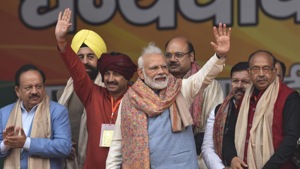 Prime Minister Narendra Modi waves at people during a rally at Ramlila Maidan in New Delhi on Sunday.((Burhaan Kinu/HT PHOTO.)) Prime Minister Narendra Modi waves at people during a rally at Ramlila Maidan in New Delhi on Sunday.((Burhaan Kinu/HT PHOTO.))