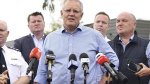 Australia's Prime Minister Scott Morrison speaks to the media during a visit to the Wollondilly Emergency Control Centre in Sydney, Sunday, Dec. 22, 2019.(AP) Australia's Prime Minister Scott Morrison speaks to the media during a visit to the Wollondilly Emergency Control Centre in Sydney, Sunday, Dec. 22, 2019.(AP)