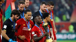 Soccer Football - Club World Cup - Final - Liverpool v Flamengo - Khalifa International Stadium, Doha, Qatar - December 21, 2019 Liverpool's Sadio Mane and teammates celebrate winning the Club World Cup with the trophy REUTERS/Corinna Kern(REUTERS) Soccer Football - Club World Cup - Final - Liverpool v Flamengo - Khalifa International Stadium, Doha, Qatar - December 21, 2019 Liverpool's Sadio Mane and teammates celebrate winning the Club World Cup with the trophy REUTERS/Corinna Kern(REUTERS)