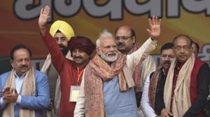 Prime Minister Narendra Modi waves at people during a rally at Ramlila Maidan in New Delhi on Sunday.(Burhaan Kinu/HT PHOTO.) Prime Minister Narendra Modi waves at people during a rally at Ramlila Maidan in New Delhi on Sunday.(Burhaan Kinu/HT PHOTO.)