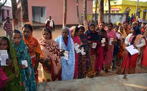 People display their ID cards as they wait in a queue to cast their vote during the fifth phase of Jharkhand Assembly Election, in Dumka on Friday.(ANI Photo) People display their ID cards as they wait in a queue to cast their vote during the fifth phase of Jharkhand Assembly Election, in Dumka on Friday.(ANI Photo)