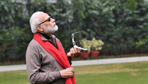 PM Modi posted picture of himself trying to watch the solar eclipse.(Twitter/@narendramodi) PM Modi posted picture of himself trying to watch the solar eclipse.(Twitter/@narendramodi)