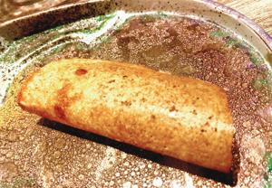 A dosa at Gaggan Anand’s new restaurant is proof that the place is more Indian in its flavours and less scientific in its presentation(Vir Sanghvi) A dosa at Gaggan Anand’s new restaurant is proof that the place is more Indian in its flavours and less scientific in its presentation(Vir Sanghvi)