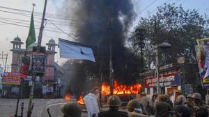 Police personnel guard a street after clashes with anti-CAA protesters in Kanpur, on Dec.21.(PTI Photo) Police personnel guard a street after clashes with anti-CAA protesters in Kanpur, on Dec.21.(PTI Photo)