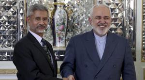 Iranian Foreign Minister Mohammad Javad Zarif, right, and his Indian counterpart, Subrahmanyam Jaishankar, shake hands for journalists prior to their meeting, in Tehran, Iran, Sunday, Dec. 22, 2019.(AP Photo) Iranian Foreign Minister Mohammad Javad Zarif, right, and his Indian counterpart, Subrahmanyam Jaishankar, shake hands for journalists prior to their meeting, in Tehran, Iran, Sunday, Dec. 22, 2019.(AP Photo)