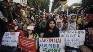 People protest against the Citizenship (Amendment) Act and the National Register of Citizens, Jamia Millia Islamia, New Delhi, December 25, 2019(Burhaan Kinu/HT PHOTO) People protest against the Citizenship (Amendment) Act and the National Register of Citizens, Jamia Millia Islamia, New Delhi, December 25, 2019(Burhaan Kinu/HT PHOTO)