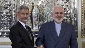 Iranian Foreign Minister Mohammad Javad Zarif, right, and his Indian counterpart, Subrahmanyam Jaishankar, shake hands for journalists prior to their meeting, in Tehran, Iran, Sunday, Dec. 22, 2019. (AP Photo/Ebrahim Noroozi)(AP) Iranian Foreign Minister Mohammad Javad Zarif, right, and his Indian counterpart, Subrahmanyam Jaishankar, shake hands for journalists prior to their meeting, in Tehran, Iran, Sunday, Dec. 22, 2019. (AP Photo/Ebrahim Noroozi)(AP)