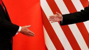 US President Donald Trump and China's President Xi Jinping shake hands.(Reuters file photo) US President Donald Trump and China's President Xi Jinping shake hands.(Reuters file photo)