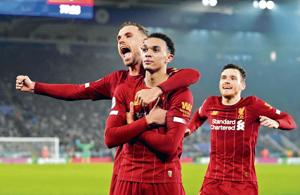 Trent Alexander-Arnold (centre) celebrates with teammates after scoring Liverpool’s fourth goal in their 4-0 rout of Leicester City on Thursday(REUTERS) Trent Alexander-Arnold (centre) celebrates with teammates after scoring Liverpool’s fourth goal in their 4-0 rout of Leicester City on Thursday(REUTERS)