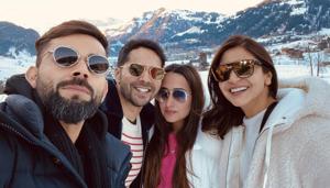 Virat Kohli, Varun Dhawan, Natasha Dalal and Anushka Sharma pose for a picture in Switzerland. Virat Kohli, Varun Dhawan, Natasha Dalal and Anushka Sharma pose for a picture in Switzerland.