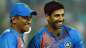A file photo of Ashish Nehra (R) and MS Dhoni.(PTI)