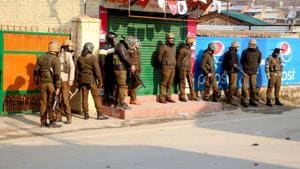 Police personnel stand guard outside a college after clash with students during a protest in Srinagar.(ANI file photo) Police personnel stand guard outside a college after clash with students during a protest in Srinagar.(ANI file photo)