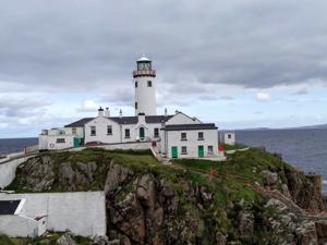 Fanad Lighthouse in County Donegal was built in 1811, after a legendary shipwreck that only the captain’s parrot survived.(Madhusree Ghosh) Fanad Lighthouse in County Donegal was built in 1811, after a legendary shipwreck that only the captain’s parrot survived.(Madhusree Ghosh)
