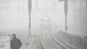 A train arrives amid dense fog, at Tilak Bridge Railway Station, in New Delhi.(HT PHOTO) A train arrives amid dense fog, at Tilak Bridge Railway Station, in New Delhi.(HT PHOTO)
