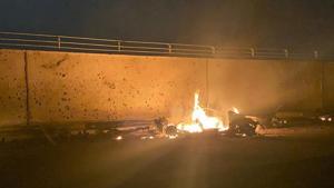 This photo released by the Iraqi Prime Minister Press Office shows a burning vehicle at the Baghdad International Airport following an airstrike, in Baghdad, early on Friday.(AP Photo) This photo released by the Iraqi Prime Minister Press Office shows a burning vehicle at the Baghdad International Airport following an airstrike, in Baghdad, early on Friday.(AP Photo)