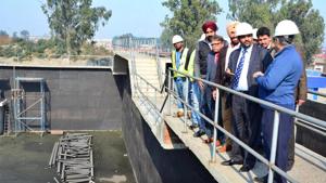 PPCB member secretary Krunesh Garg (second from right) and other PPCB officials at the Tejpur road common effluent treatment plant in Ludhiana on Friday.(GURPREET SINGH/HT) PPCB member secretary Krunesh Garg (second from right) and other PPCB officials at the Tejpur road common effluent treatment plant in Ludhiana on Friday.(GURPREET SINGH/HT)