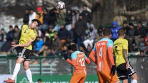 Real Kashmir FC players (yellow) and Chennai City FC players vie for the ball during their I-League match.(PTI) Real Kashmir FC players (yellow) and Chennai City FC players vie for the ball during their I-League match.(PTI)