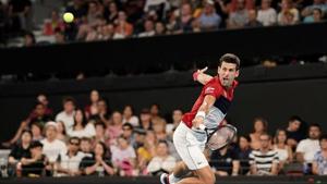 Novak Djokovic of Serbia returns during his singles match against Kevin Anderson of South Africa on day 2 of the ATP Cup tennis tournament at Pat Rafter Arena in Brisbane, Australia, January 4, 2020.(REUTERS) Novak Djokovic of Serbia returns during his singles match against Kevin Anderson of South Africa on day 2 of the ATP Cup tennis tournament at Pat Rafter Arena in Brisbane, Australia, January 4, 2020.(REUTERS)
