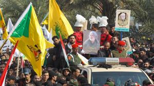 Mourners surround a car carrying the coffin of Iranian military commander Qassem Soleimani, Baghdad, January 4(AFP) Mourners surround a car carrying the coffin of Iranian military commander Qassem Soleimani, Baghdad, January 4(AFP)
