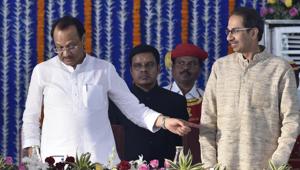 AJit Pawar and Uddhav Thackeray during the swearing in ceremony for Maharashtra cabinet expansion at Vidhan Bhavan in Mumbai, India, on Monday, December 30, 2019.(Anshuman Poyrekar/HT Photo) AJit Pawar and Uddhav Thackeray during the swearing in ceremony for Maharashtra cabinet expansion at Vidhan Bhavan in Mumbai, India, on Monday, December 30, 2019.(Anshuman Poyrekar/HT Photo)