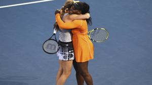 Denmark's Caroline Wozniacki, left, and Untied States' Serena Williams celebrate their win.(AP) Denmark's Caroline Wozniacki, left, and Untied States' Serena Williams celebrate their win.(AP)