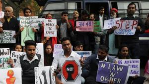 People hold placards at a protest against incidents of rape, in Hyderabad.(Reuters Photo) People hold placards at a protest against incidents of rape, in Hyderabad.(Reuters Photo)