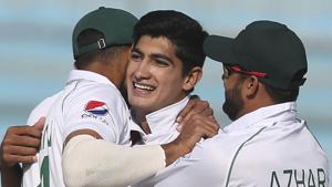 File image of Pakistan cricketer Naseem Shah celebrating the fall of a wicket with teammates.(AP) File image of Pakistan cricketer Naseem Shah celebrating the fall of a wicket with teammates.(AP)