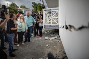 Governor Wanda Vazquez inspects an earthquake-damaged house in Guanica, Puerto Rico on January 6.(AP) Governor Wanda Vazquez inspects an earthquake-damaged house in Guanica, Puerto Rico on January 6.(AP)
