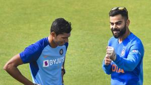 Indian skipper Virat Kohli with teammate Navdeep Saini(PTI) Indian skipper Virat Kohli with teammate Navdeep Saini(PTI)