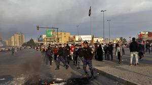 Protesters during a protest against the Iranian missile strike in Baghdad, Iraq.(AP Photo) Protesters during a protest against the Iranian missile strike in Baghdad, Iraq.(AP Photo)