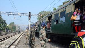 Security personnel stand guard near railway track during a nationwide strike called by trade unions, at Serampore in Kolkata on Wednesday.(ANI Photo) Security personnel stand guard near railway track during a nationwide strike called by trade unions, at Serampore in Kolkata on Wednesday.(ANI Photo)