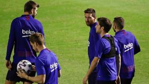 Barcelona's Lionel Messi with teammates during training.(REUTERS) Barcelona's Lionel Messi with teammates during training.(REUTERS)