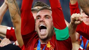 File image: Liverpool's Jordan Henderson lifts the Club World Cup trophy.(REUTERS) File image: Liverpool's Jordan Henderson lifts the Club World Cup trophy.(REUTERS)