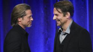 Actor Brad Pitt, left, accepts the best supporting actor award for Once Upon A Time… in Hollywood, from actor Bradley Cooper at the National Board of Review Awards gala.(Evan Agostini/Invision/AP) Actor Brad Pitt, left, accepts the best supporting actor award for Once Upon A Time… in Hollywood, from actor Bradley Cooper at the National Board of Review Awards gala.(Evan Agostini/Invision/AP)