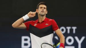 Novak Djokovic of Serbia gestures to the crowd during their ATP Cup tennis match against Denis Shapovalov of Canada.(AP) Novak Djokovic of Serbia gestures to the crowd during their ATP Cup tennis match against Denis Shapovalov of Canada.(AP)