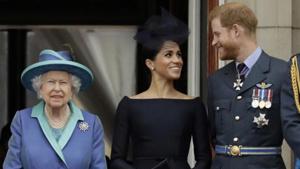 Britain's Queen Elizabeth II, and Meghan the Duchess of Sussex and Prince Harry(AP file photo)