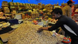 Jammu, India – January 12, 2020: A roadside vendor displays customary eatables like peanuts, popcorns and other snacks ahead of Lohri festival, which will celebrated on 13th January every year in Jammu, on Sunday, January 12, 2020. On the Lohri day people fly kites in the day and light bonfires in the night to celebrate the event Lohri.(Photo by Nitin Kanotra / Hindustan Times) Jammu, India – January 12, 2020: A roadside vendor displays customary eatables like peanuts, popcorns and other snacks ahead of Lohri festival, which will celebrated on 13th January every year in Jammu, on Sunday, January 12, 2020. On the Lohri day people fly kites in the day and light bonfires in the night to celebrate the event Lohri.(Photo by Nitin Kanotra / Hindustan Times)