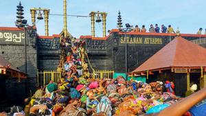 Devotees throng the Lord Ayyappa temple to offer prayers, at Sabarimala in Kerala on December 31, 2019.(PTI Photo) Devotees throng the Lord Ayyappa temple to offer prayers, at Sabarimala in Kerala on December 31, 2019.(PTI Photo)