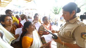 A police personnel checking the age proof of women devotees at the Pamba base camp of Sabarimala Temple when the shrine was opened for Mandala-Makaravilakku pooja in November 2019.(Vivek R Nair/HT File Photo) A police personnel checking the age proof of women devotees at the Pamba base camp of Sabarimala Temple when the shrine was opened for Mandala-Makaravilakku pooja in November 2019.(Vivek R Nair/HT File Photo)