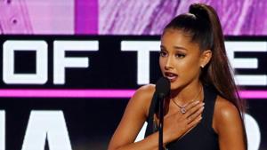Ariana Grande accepts the award for artist of the year at the 2016 American Music Awards in Los Angeles. Ariana Grande accepts the award for artist of the year at the 2016 American Music Awards in Los Angeles.
