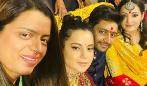 Kangana Ranaut poses with the newly-engaged couple and sister Rangoli. Kangana Ranaut poses with the newly-engaged couple and sister Rangoli.