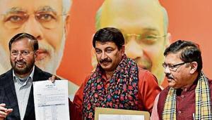 BJP Delhi poll in-charge Prakash Javadekar (left) and Delhi party chief Manoj Tiwari (centre) releasing the first list. BJP Delhi poll in-charge Prakash Javadekar (left) and Delhi party chief Manoj Tiwari (centre) releasing the first list.