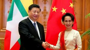 Myanmar State Counselor Aung San Suu Kyi shakes hands with Chinese President Xi Jinping at the Presidential Palace in Naypyitaw, Myanmar.(REUTERS) Myanmar State Counselor Aung San Suu Kyi shakes hands with Chinese President Xi Jinping at the Presidential Palace in Naypyitaw, Myanmar.(REUTERS)