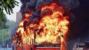 At least four buses were torched, 100 people injured and over 100 vehicles damaged on December 15. At least four buses were torched, 100 people injured and over 100 vehicles damaged on December 15.