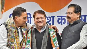 AAP MLA from Dwarka, Adarsh Shastri, joined the Congress on Saturday, flanked by the party’s Delhi unit chief Subhash Chopra (left) and AICC in-charge for Delhi PC Chacko (right). AAP MLA from Dwarka, Adarsh Shastri, joined the Congress on Saturday, flanked by the party’s Delhi unit chief Subhash Chopra (left) and AICC in-charge for Delhi PC Chacko (right).