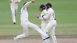 England's Ollie Pope celebrates taking the catch to dismiss South Africa's Rassie van der Dussen off the bowling of Joe Root.(REUTERS) England's Ollie Pope celebrates taking the catch to dismiss South Africa's Rassie van der Dussen off the bowling of Joe Root.(REUTERS)